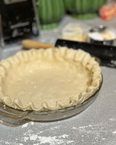 an uncooked pie crust sits on the counter