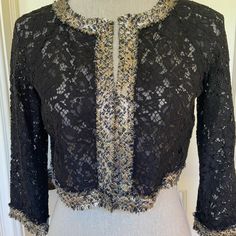 ~Kay Unger~ Kay Unger New York Black Sheer Lace Crop Jacket 3/4 Sleeve W/ Platinum Trim Nwt Size 2 Color Black Stunning Lace Bolero, Shrug, Cropped Jacket With Gorgeous Trim, The Color Of The Trim Will Go With Gold And Silver! Last Picture Of Reference Only, The Jacket Sold Doesn't Have The Additional Trim Near The Shoulder Product Description Metallic Stitching Hits At Waist Lightweight Collarless, Open Front Nylon/Cotton/Polyester/Acetate/Spandex Imported Dry Clean Approximate Measurements: Le Fall Party Outerwear With 3/4 Sleeves, Black 3/4 Sleeve Blazer For Spring, Black 3/4 Sleeve Formal Outerwear, Black Formal Outerwear With 3/4 Sleeve, Lace Bolero, Bolero Shrug, Kay Unger, Cropped Jacket, Crop Jacket