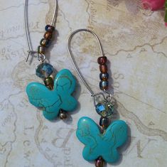 Turquoise Butterfly With Glass Beads Drop Earrings. One Of A Kind. Turquoise Beaded Earrings With Colorful Czech Glass, Turquoise Beaded Earrings With Czech Glass, Turquoise Beaded Earrings In Czech Glass, Turquoise Earrings With Colorful Czech Glass Beads, Handmade Turquoise Beaded Earrings With Czech Glass, Turquoise Wire Wrapped Czech Glass Earrings, Handmade Turquoise Butterfly Jewelry, Turquoise Wire Wrapped Beaded Earrings As Gift, Turquoise Czech Glass Beaded Earrings For Pierced Ears