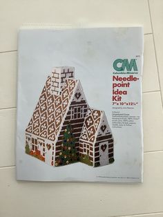 a piece of paper with an image of a gingerbread house on it