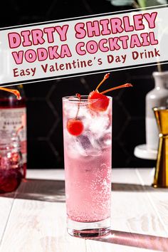 a pink drink with two cherries in it and a sign that says dirty shriley vodka cocktail easy valentine's day drink