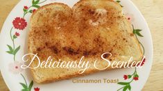 a heart - shaped toast on a plate with the words deliciously scented cinnamon toast