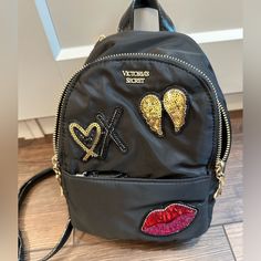 Victoria’s Secret Mini Backpack Cute Mini Backpack With Gold Zip And Glitter Decorations Xoxo Nwot Victoria's Secret Black School Bag, Victoria's Secret Backpack With Zipper Closure, Victoria's Secret Backpack With Zipper, Victoria's Secret Backpack With Adjustable Strap For Travel, Victoria's Secret School Backpack With Adjustable Strap, Victoria's Secret Travel Backpack, Victoria's Secret Everyday Backpack With Adjustable Strap, Trendy Victoria's Secret Backpack For Daily Use, Victoria's Secret Casual Backpack For Everyday