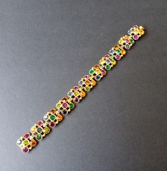 Vintage Colorful Rhinestone Bracelet 1980's 1990's Jewelry Measurements Length - 8 inches Width - 5/8 inch In very good vintage condition. A nice addition to any collection. D203 Jewelry Measurements, Desert Hot Springs, Bracelet Vintage, Rhinestone Bracelet, Hot Springs, Favorite Jewelry, Wedding Gifts, Jewelry Bracelets, Accessory Gift