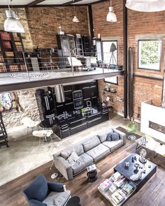 an aerial view of a living room and kitchen