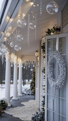 Get inspired by these 15 festive Christmas porch decorating ideas! From wreaths to lights, find the perfect accents to welcome guests this holiday season. Elegant Outdoor Christmas Decorations, Balkon Winter, Snow Christmas Decorations, Porch Christmas Decorations, Christmas Porch Decorating Ideas, Christmas Porch Decor Ideas, Outside Christmas Decorations, Porch Decorating Ideas, Christmas Decor Inspiration