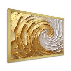 an abstract gold and white painting on the wall