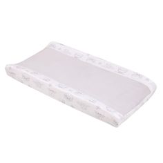 a baby crib mattress that is white and has elephants on it