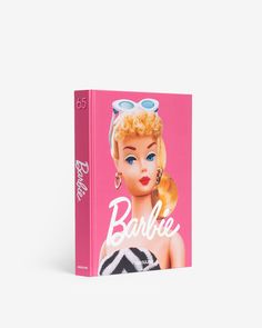 a pink book with an image of a barbie doll wearing sunglasses and the words barbie on it