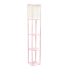 a pink shelving unit stands against a white background with a light colored shelf in the middle