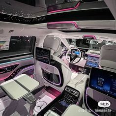 the interior of a car with all white and pink lights