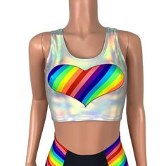 Made of shimmering iridescent opal holographic spandex fabric, this crop tank top is perfect for the next pride parade or event. This festival top fits snug to the body and falls above the belly button with a scoop neckline and large rainbow striped heart applique. Lgbtq Outfit, Heart Crop Top, Striped Heart, Pride Heart, Heart Applique, Harley Quinn Costume, Pride Parade, Festival Tops, Small Crop Tops