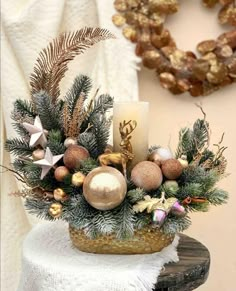 a basket filled with christmas decorations on top of a table