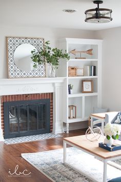 the living room is clean and ready to be used for entertaining purposes, as well as decorating