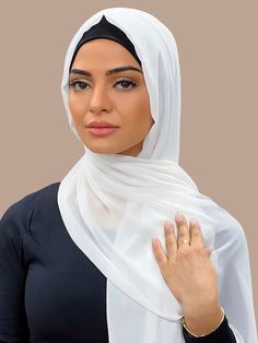 Our Luxury Chiffon hijab-Pearl White is perfect for every occasion. With the softest chiffon fabric we could find, our Luxury Chiffon will become your go to hijab whether you're going out to a fancy party or keeping it casual, looking beautiful is effortless! Fabric: Polyester Chiffon Dimension: 70" x 27" Contour: Long Rectangle Thickness: Light Texture: Smooth Care: Machine or hand wash in warm water, tumble dry or air dry, iron if needed. Hijab Fabric, Chiffon Hijab, Fancy Party, Light Texture, Chiffon Fabric, Air Dry, Pearl White, Warm Water, Quality Fabric