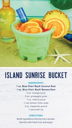 an advertisement for island sunrise bucket with oranges and drinks on the table next to it