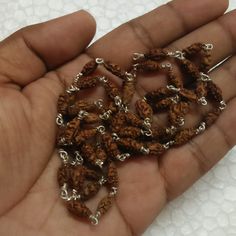 1 Mukhi Rudraksh  Mala / One Mukhi Rudraksha Mala / Shiva Netra Mala  55 Bead - Lab Certified Origin : Java / Indonesia Avg Bead Size  : 8 mm - 10 mm Number of Beads : 55 Length : 30 inches (From its bead to 55 bead) // 16 inches (Around the neck)  - Approx Traditional Silver Mala For Meditation, Silver Spiritual Mala For Puja, Handmade Silver Mala For Rituals, Silver Spiritual Mala For Festivals, Spiritual Silver Mala With 8mm Beads, Hand-strung Silver Spiritual Mala, Handmade Silver Mala For Festivals, Silver Hand-strung Spiritual Mala, Spiritual Silver Hand-strung Mala