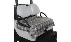 a white and black golf cart with a checkered blanket on it's seat