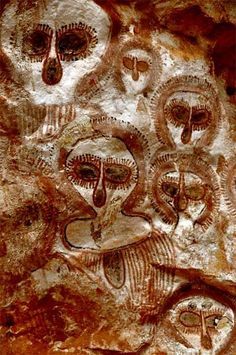 an image of some animals and people on a rock face painting in the caves