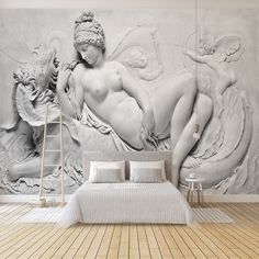 a bedroom with a large mural on the wall