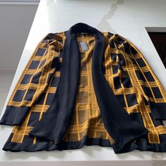 Nwt Black And Gold Long Cardigan. Textured Collar And Sleeves. Length 31 Inches Black Open Front Top For Fall, Black Open Front Top For Work, Black Open Front Tops For Work, Black Open Front Cardigan For Work, Gold Cardigan, Flowy Cardigans, Jersey Cardigan, Aztec Cardigan, Cable Knit Sweater Cardigan