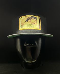 This caro Quintero flat bill SnapBack makes as a great gift to you or someone else. Every hat comes with a complementary decal and first class shipping. Embroidery on the front and back. If you have any questions feel free to let me know! Follow us on Instagram! @Buenamadera1978 ------------------------ Esta gorra de Caro Quintero es un gran regalo para ti o para otra persona. Cada cachucha viene con una calcomanía complementaria y envío de primera clase. Bordado en la parte delantera y trasera. Retro Black Baseball Cap With Flat Bill, Retro Black Flat Bill Baseball Cap, Black Retro Fitted Hat With Flat Brim, Retro Black Snapback Cap, Black Snapback Hat With Flat Bill, Retro Black Fitted Cap, Black Trucker Hat With Flat Bill, Retro Black Snapback Fitted Hat, Retro Black Adjustable Fitted Hat