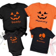 Custom Family Pumpkin Face Shirt, Halloween Family Matching Tshirt, Halloween Mom Dad Childs Shirts, Pumpkin Family Outfit, Spooky Party Tee The Pumpkin Face Halloween Shirt is the perfect way to bring spooky fun to your Halloween celebrations! Our Family Matching Halloween Tshirt is ideal for creating memorable moments with loved ones. Whether you're attending a Halloween party or just want to get into the festive spirit, our Halloween Party Group Shirts ensure everyone looks coordinated and st Family Matching Halloween T-shirt With Letter Print, Family Matching Black Tops For Halloween, Family Matching Halloween Tops Short Sleeve, Orange Halloween Tops With Character Print, Family Matching Halloween Tops With Graphic Print, Family Matching Halloween Graphic Print Tops, Halloween Character Print Tops For Costume Party, Halloween Orange T-shirt With Cartoon Print, Orange Halloween T-shirt With Cartoon Print