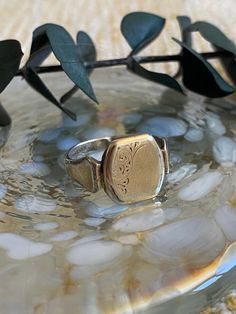 A nice original vintage 9ct gold on silver signet ring with a pretty engraved pattern on the face. This chunky ring still has a decent layer of its 9ct gold covering on the silver and is in decent condition for a ring of over 50 years old.  Uk size P, which is a US size 8. Great for a man as a pinky ring or a woman as a signet ring on any finger. Heirloom Gold Rings For Memorial, Heirloom Style Hallmarked Engraved Ring For Memorial, Heirloom Engraved Signet Ring For Memorial, Antique Oval White Gold Signet Ring, Victorian Engraved Signet Promise Ring, Vintage Gold Ring For Memorial, Heirloom Memorial Engraved Signet Ring, Vintage Oval Hallmarked Signet Ring, Classic Gold Engraved Ring For Memorial