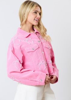 Get ready to turn heads in our Bubblegum & Bows Jacket. This oversized, bubblegum pink corduroy jacket features charming pearl bows and a raw hem, making it the perfect statement piece for any outfit. Plus, with convenient pockets, it's both stylish and fun!