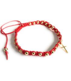 "Red Sting Gold Plated Adjustable Cross Bracelet This is a beautiful and simple bracelet. It is made with 4mm gold filled balls and red nylon cotton cord. It is handwoven with a macrame square knot. At the center has a dainty 18K gold plated 1cm cross pendant. It is perfect for daily wear and looks great with any outfit. Details: Adjustable from 6\" to 9\" (15-23cm) approximately. It is carefully shipped in a beautiful organza pouch, bubble wrapped and well protected." Macrame Square, Macrame Square Knot, St Jude Necklace, String Bracelets, Red String Bracelet, Organza Pouch, Square Knot, Bracelet Simple, Red String