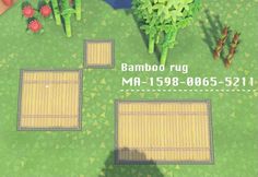 an aerial view of bamboo rugs in the middle of a green area with trees and flowers