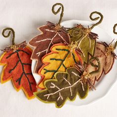 decorative fall leaves on a white plate