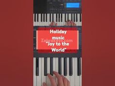 someone is playing the piano with an ad on it that reads holiday music, joy to the world