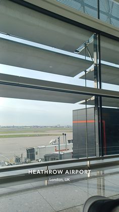 an airport window with the words heathrow airport on it