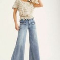 Brand New We The Free Hailey Low Rise Bell Bottom Denim Jeans 0b908810 Free People Hailey Low Rise Bell Bottom Jeans $128.00 Retail Price Color: Palma Indigo (Blue) Size : 25 Low-Rise Retro-Style Bell Bottom Jeans Featuring Buttoned Front Patch Pockets With Flaps And Frayed Raw Hems. Four-Pocket Style Button Closure And Zip Fly Relaxed Fit Seam Down The Back Perfectly Distressed, All-American Styles. We The Free Is An In-House Label. Care: Machine Wash Cold Import Measurements For Size 25 Waist: Spring Flare Jeans In Washed Blue With Pockets, Spring Washed Blue Flare Jeans With Pockets, Chic Washed Blue Flare Jeans For Spring, Chic Spring Flare Jeans With Pockets, Chic Washed Blue Jeans For Spring, Chic Washed Blue Flare Jeans For Summer, Low Rise Bell Bottom Jeans, Jeans Free People, Bottom Jeans