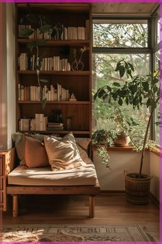 a living room filled with lots of furniture and bookshelves next to a window