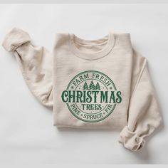 Farm Fresh Christmas Trees Sweater.  Cute seasonal crewneck. Add a touch of holiday cheer and excitement to your holiday celebrations. This sweatshirt is a super soft combination of cotton and polyester and will keep you warm all winter, and with our super soft dtf durable image this item will last many winters to come. This item is custom made to order in our home shop just for you as soon as your order is placed. --> OUR SWEATERS AND MATERIALS <-- 8 oz., 50% cotton, 50% polyester Heather Sport Christmas Tree Farm Sweatshirt, Christmas Sweaters Cricut, Christmas Sweater Cricut, Cute Christmas Sweatshirts, Sweatshirt Designs Vinyl, Cute Christmas Sweaters, Outdoorsy Shirt, California Christmas, Farm Fresh Christmas Trees