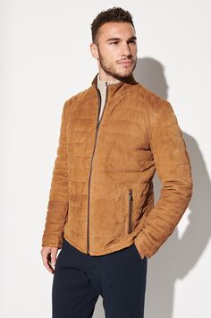 Our sporty Gavin jacket is ready to take on autumn. Made from soft yet durable lamb suede, this quilted leather jacket is the perfect style for all your cool-weather activities, from exploring new vistas to enjoying a backyard bonfire. A classic cut with standup collar and full front zip pairs perfectly with your favorite jeans and boots, while four pockets offer space to store your keys and phone. Quilted Leather Jacket For Cold Weather, Quilted Long Sleeve Leather Jacket For Cold Weather, Brown Quilted Jacket With Padded Collar For Fall, Casual Suede Leather Jacket For Winter, Winter Quilted Leather Biker Jacket, Quilted Leather Biker Jacket For Fall, Winter Suede Outerwear With Zipper Closure, Quilted Leather Puffer Jacket For Cold Weather, Leather Puffer Jacket With Padded Collar