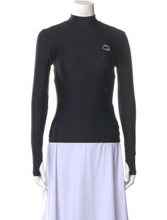 Coperni Top. Black. Long Sleeve with Mock Neck. Fit:Tops by Coperni typically fit true to size.