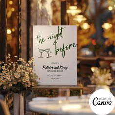 there is a sign that says the night before with flowers in front of it and an image of a wine glass