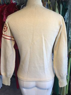 "1960s vintage letterman sweater. All wool off white. Puritan Sportswear \"Natch\". \"National thespian\" patch with comedy and tragedy masks. \"Jo-ell\" patch. \"63\" patches with red/white stripe around arm. Preppy. Varsity. Fits like women's S. Garment is in perfect vintage condition. There are a few small stains here and there. Freshly laundered and ready to wear! Measurements are as follows: (taken while lying flat) Shoulder = 15\" Pit to pit = 17 1/2\" Hem opening = 17 1/2\" (half measurem Comedy And Tragedy Masks, Letterman Sweaters, Tragedy Mask, Comedy And Tragedy, Quilted Pillow, Red And White Stripes, 1960s Vintage, White Stripe, Red White