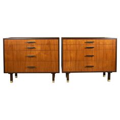 pair of mid - century modern walnut and brass dressers, circa 1950's