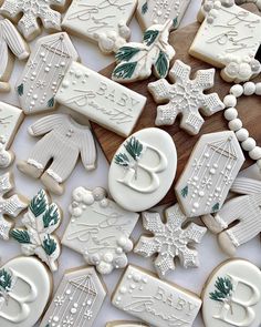 some decorated cookies are laying on a table