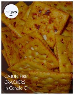 there is a pile of cooked crackers on the plate with text overlay that reads cajun fire crackers in canada oil