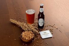 beer and grains on a wooden table