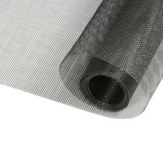 a roll of black mesh on top of a white surface