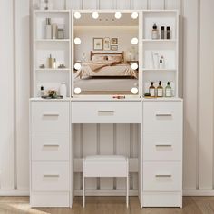 a white vanity with lighted lights and drawers