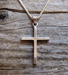 DESCRIPTION: A classy and classic symbol of the Christian faith in this simple, unadorned cross pendant.   WEIGHT: 7.3 grams     SIZE / MEASUREMENTS:  Cross is 1 1/2 inches tall x 1 inch wide on a 20 inch box chain. MARKINGS / HALLMARKS: Stamped '925' for sterling silver on the back. MATERIALS:  Sterling silver    CONDITION:   Beautiful vintage condition with only the light surface burnish on the metal expected in a piece of this age.  I clean vintage pieces by gently washing with dish soap (vin Pendant Necklace Simple, Coin Bracelet, Antique Pendant, Necklace Simple, Gold Cross, Simple Necklace, Gold Coins, Silver Cross, Silver Accents