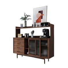 the sideboard is made out of wood and has glass doors, drawers, and shelves