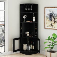 a black shelf with bottles and glasses on it next to a potted plant in front of a window